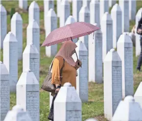  ?? BANDIC/AP FILE DARKO ?? The Internatio­nal Court of Justice and the Internatio­nal Criminal Court for Former Yugoslavia declared the Bosnian Serb killings of more than 8,000 Bosniaks that took place in Srebrenica during the Bosnian War as genocide.
