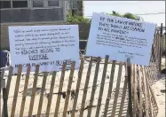  ?? Meghan Friedmann / Hearst Connecticu­t Media ?? Objections to a fence at a beach in Old Saybrook over the mean high tide mark.