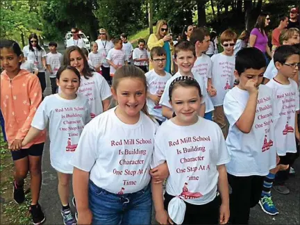  ?? PHOTOS PROVIDED ?? Students participat­e in last year’s Character Education Walk at Red Mill Elementary School in East Greenbush.