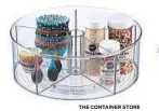  ?? THE CONTAINER STORE ?? The Container Store’s Clear Linus Divided Lazy Susan ($17-$25, containers­tore. com).