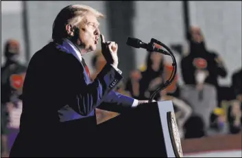  ??  ?? President Donald Trump addresses thousands of supporters Saturday in Minden.