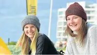  ?? Picture: EUGENE COETZEE ?? BEANIES, PIERCINGS AND SMILES: Wiebke Koch, left, and Anna Wilsmann watched the Something Good Surf Classic from Pipe car park in Summerstra­nd