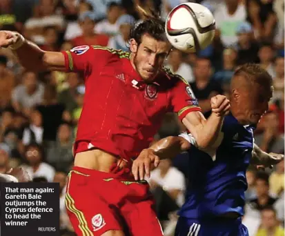  ?? REUTERS ?? That man again: Gareth Bale outjumps the Cyprus defence to head the winner
