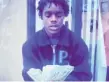  ?? | COURT EXHIBIT ?? Divonte Hall, a No Love Money Gang member, is in Cook County Jail charged in a triple shooting.
| FACEBOOK Tyrell Thomas ( above), identified by authoritie­s as a member of T. J. Jimenez’s gang, was caught on a security video on April 12, 2015, outside...