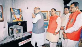  ??  ?? BJP president Amit Shah (left) and Gujarat CM Vijay Rupani (second from left) pay tribute to Sardar Vallabhbha­i Patel in Karamsad before kicking off Gaurav Yatra in Gujarat on Sunday. PTI PHOTO