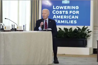  ?? ANDREW HARNIK — THE ASSOCIATED PRESS ?? President Joe Biden speaks during a meeting of his Competitio­n Council to announce new actions to lower costs for families in the State Dining Room of the White House in Washington, Tuesday.