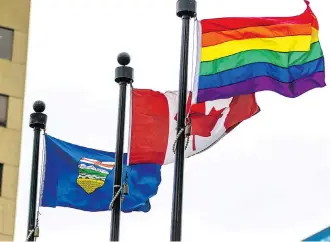  ?? FILES ?? The rainbow banner flies with the Canadian and Alberta flags to celebrate Pride Week in August.