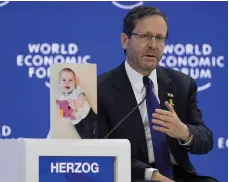  ?? AP ?? Israeli President Isaac Herzog speaks at the World Economic Forum in Davos