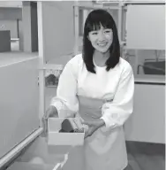  ??  ?? Organizati­onal expert Marie Kondo introduces her new line of storage boxes this month in New York. SETH WENIG/AP