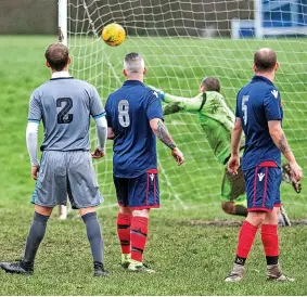  ?? ?? BACK OF THE NET: Ben Glover scores for Wolstanton against Cheshire Cheese.