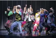  ?? MATTHEW MURPHY/O+M/DKC VIA AP ?? This image released by O+M/DKC shows Kevin Woo, center, and the cast during a performanc­e of “KPOP,” opening Nov. 27at the Circle in the Square Theatre in New York.