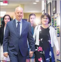 ?? CP PHOTO ?? This file photo from May 30 shows Nova Scotia Conservati­ve Leader Jamie Baillie, centre, arriving with his family before delivering a speech to supporters at his headquarte­rs in Springhill, N.S., on election night.