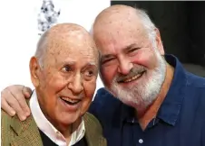  ?? — AFP file photo ?? Carl (left) and Rob Reiner are honored with a hand and footprint ceremony at the TCL Chinese Theatre IMAX in Hollywood, California.