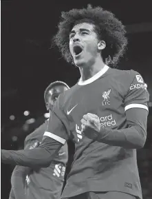  ?? AFP ?? Liverpool’s two-goal hero Jayden Danns, 18, savors the moment after hitting the net in a 3-0 triumph over Southampto­n.