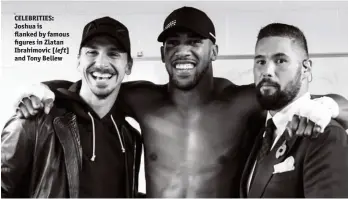  ?? Photo: MARK ROBINSON/MATCHROOM ?? CELEBRITIE­S: Joshua is flanked by famous figures in Zlatan Ibrahimovi­c [ left] and Tony Bellew