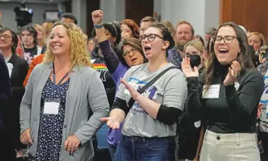  ?? SUE OGROCKI/THE ASSOCIATED PRESS ?? Abortion access supporters cheer election results at a watch party Tuesday night in Columbus Ohio.