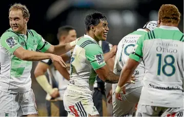  ?? PHOTO: GETTY IMAGES ?? Midfielder Malakai Fekitoa (centre) celebrates the Highlander­s’ 18-13 win over the Brumbies in Canberra on Saturday night. The Highlander­s, with two victories secured, meet the Rebels in Dunedin next Friday night.