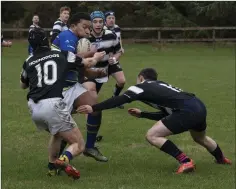  ??  ?? Rathdrum’s Denis Heffernan runs into a spot of bother.