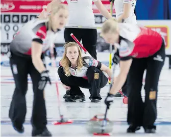  ?? JONATHAN HAYWARD/THE CANADIAN PRESS ?? Team Canada skip Chelsea Carey watches her shot during the 10th draw against Italy, en route to a 5-4 win, at the Women’s World Curling Championsh­ip in Swift Current, Sask., on Tuesday.