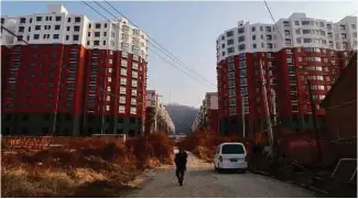  ?? REUTERS PIC ?? Growth in Chinese home prices eased to a nine-month low in January.