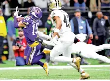  ?? - AFP photo ?? Adam Thielen #19 of the Minnesota Vikings catches a 43-yard pass during overtime against the New Orleans Saints in the NFC Wild Card Playoff game at Mercedes Benz Superdome in New Orleans, Louisiana.