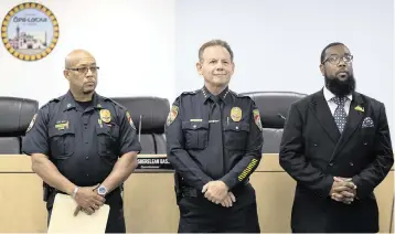  ?? MATIAS J. OCNER mocner@miamiheral­d.com ?? From left, Interim Opa-locka Police Chief Kenneth D. Ottley, outgoing Opa-locka Police Chief Scott Israel and Opa-locka Mayor John Taylor attend a press conference at the city’s municipal complex Friday.