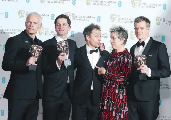  ?? — THE ASSOCIATED PRESS ?? Writer-director Martin McDonagh, left — sharing one of five BAFTA wins along with producer Peter Czernin, actors Sam Rockwell, Frances McDormand and producer Graham Broadbent — calls the film ‘hopeful’ but ‘also an angry one.’