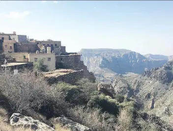  ?? PHOTOS: MIMI KIRK/WASHINGTON POST ?? Tiny villages seem to cling to the peaks of Jebel Akhdar, the rugged central region of Oman’s al-Hajar Mountains, which stretch from the Musandam Peninsula to the seaside town of Sur.