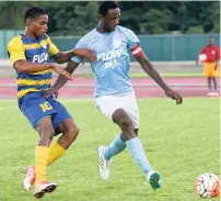  ?? FILE ?? Ruseas High’s Nazime Matalie (left) tackles Brown’s Town High’s Franklyn Thompson (right) for possession of the ball during their second-round ISSA/FLOW DaCosta Cup match at Montego Bay Sports Complex on Saturday, October 14. Brown’s Town won 1-0.