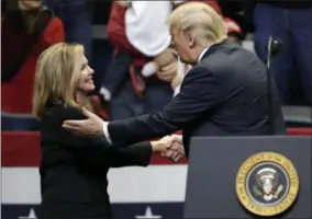  ?? MARK HUMPHREY — THE ASSOCIATED PRESS ?? President Donald Trump introduces Rep. Marsha Blackburn, R-Tenn., at a rally Sunday in Chattanoog­a, Tenn.