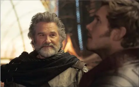  ??  ?? Kurt Russell as Ego, left, is now the paternal figure opposite Chris Pratt’s Star-Lord Peter Quill in Guardians of the Galaxy Vol 2.