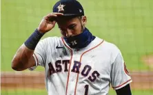  ?? Karen Warren / Staff photograph­er ?? Carlos Correa agreed to a $5 million salary last year, avoiding arbitratio­n, but may not be able to avoid a hearing this year.