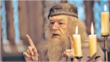  ??  ?? Faux pax: the Harry Potter author said her character Dumbledore (played by Michael Gambon in the film franchise) had enjoyed a gay crush as a young wizard