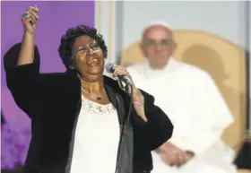  ?? Carl Court / Getty Images ?? Aretha Franklin performs at the Festival of Families for Pope Francis. The pope’s first U.S. visit ends Sunday evening after he celebrates a public Mass.