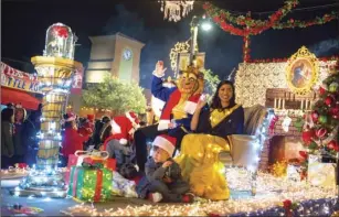  ??  ?? El Centro Regional Medical Center’s “Beauty and the Beast” themed float during the 15th annual Parade of Lights on Friday night in Imperial. VINCENT OSUNA PHOTO