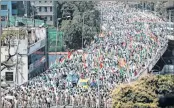  ?? —PTI ?? Congress workers take out a rally 'Raj Bhavan Chalo' in support of farmers in Bengaluru on Wednesday.