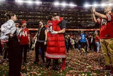  ?? ?? Fullback Kyle Juszczyk celebrates with wife Kristin after the 49ers won the NFC title on Jan. 28.