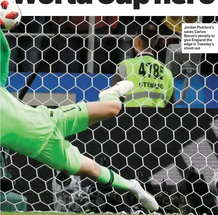  ??  ?? Jordan Pickford’s saves Carlos Bacca’s penalty to give England the edge in Tuesday’s shoot-out