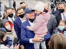  ?? Evan Vucci / Associated Press ?? President Joe Biden meets with Ukrainian refugees Saturday at PGE Narodowy Stadium, in Warsaw, Poland.