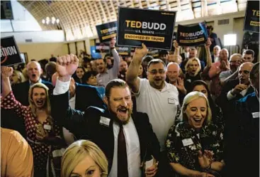  ?? MELISSA SUE GERRITS/GETTY ?? Supporters of Rep. Ted Budd, R-NC, celebrate his Senate GOP nomination at a party Tuesday.