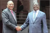  ?? PICTURE: AP/BRIAN INGANGA ?? President Kenyatta, left, held a surprise meeting with his political arch-rival and National Super Alliance (Nasa) leader Raila Odinga, right, at Harambee House in Nairobi on Friday.