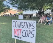  ?? TANIA BARRICKLO — DAILY FREEMAN ?? Several hundred people gathered outside on the lawn in front of Kingston High School for the Wednesday Walks for Black Lives on July 29, 2020. Speakers addressed the issue of removing student resource officers in schools.