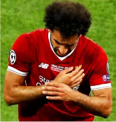  ?? — Reuters photo ?? Liverpool’s Mohamed Salah reacts after sustaining an injury during the Champions League final against Real Madrid at NSC Olympic Stadium in Kiev, Ukraine in this May 26 file photo.