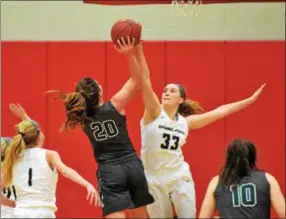  ?? AUSTIN HERTZOG - DIGITAL FIRST MEDIA ?? Spring-Ford’s Olivia Olsen (33) blocks the shot of Methacton’s Sydney Tornetta during the first half of their PAC semifinal Saturday at Boyertown.