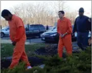  ?? TANIA BARRICKLO — DAILY FREEMAN ?? Murder suspects Kevin Gardener, left, and Maurice Stansberry Jr. are led into Ulster Town Court on Tuesday.