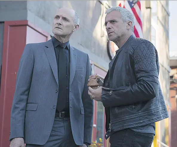  ?? LES FILMS SÉVILLE ?? Actors Colm Feore, left, and Patrick Huard are reprising their roles as Martin Ward and David Bouchard from the original film in Bon Cop Bad Cop 2.