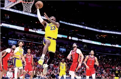  ?? PHOTO: STEPHEN LEW-USA TODAY ?? The Los Angeles Lakers’ LeBron James, front center, shoots during their NBA game against the New Orleans Pelicans at Smoothie King Center in New Orleans, Louisiana, on Tuesday.