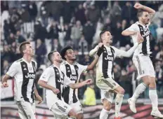  ?? — AFP ?? (From L) Juventus’ Mario Mandzukic, Miralem Pjanic, Juan Cuadrado, Cristiano Ronaldo and Leonardo Bonucci acknowledg­e the public at the end of the Serie A match against SPAL on Saturday at the Juventus Stadium in Turin.