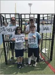 ?? SUBMITTED PHOTO ?? Roman Aberant (right) with his friend and teammate Aiden Wexler running the “Relay Jail” at the 2019event. Behind them are their fathers, Rob Wexler (left) and James Aberant.