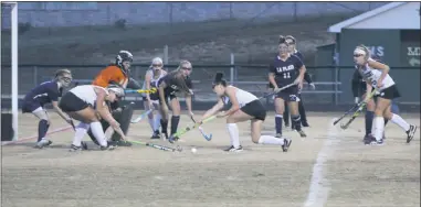  ?? STAFF PHOTO BY TED BLACK ?? This scene played out quite frequently throughout the first half of Wednesday’s 1A South Region field hockey championsh­ip at Patuxent High School as the Panthers spent ample time in the Warriors’ circle taking shots against La Plata goalie Kelly Resendes who collected 18 saves in an 8-0 Patuxent victory that gave the team its fourth straight region title.